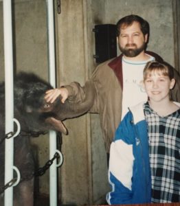 My dad and me with my “first-born”, Raja the elephant.